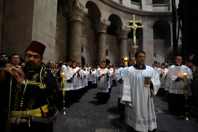 Catholic clergy take part in a procession during Easter Mass at the Church of the Holy Sepulchre in Jerusalem's Old City [File: Ahikam Seri/Reuters] in https://www.aljazeera.com/podcasts/2024/3/29/the-take-the-meaning-of-easter-in-palestine